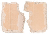 Two pieces of brown corrugated cardboard