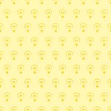 Seamless vector pattern with light bulbs on yellow background texture