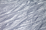 Background of off-piste ski slope with trace from ski and snowbo