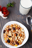 Healthy muesli breakfast with huts and raisin