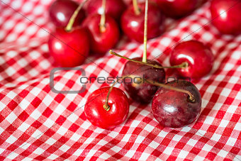 cherries on red napkin