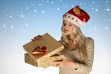pretty christmas girl opening gift box 
