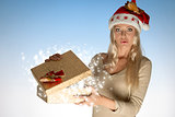 surprised woman with christmas box