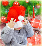 Naughty boy in Santa hat