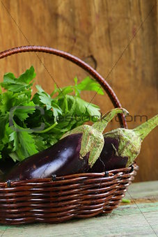 ripe purple eggplant on a wooden background