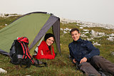 Young people camping in the mountains