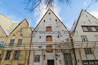 The facade of old buildings requiring restoration