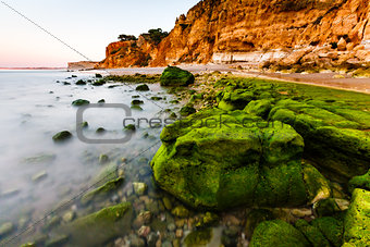 Green Stones at Porto de Mos Beach in Lagos, Algarve, Portugal