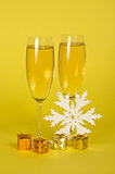 Christmas champagne in wine glasses small gift boxes