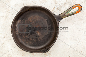 iron pan on a ceramic tile