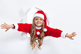 Happy santa girl opening the holidays season