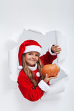 Little santa girl saving for christmas presents