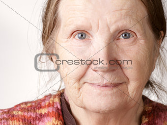 senior woman smiling to camera