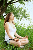 woman meditating in the lotus