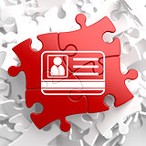ID Card Icon on Red Puzzle.