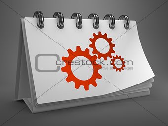 Desktop Calendar with Cogwheel Gear Icon.