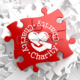 Charity Concept on Red Puzzle.