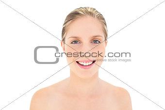 Smiling fresh blonde woman looking at camera