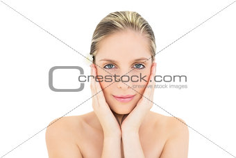 Thinking fresh blonde woman holding her head