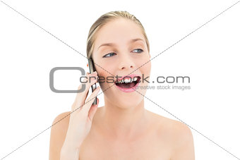 Laughing fresh blonde woman making a phone call