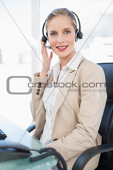 Peaceful blonde call centre agent posing