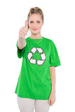 Pretty blonde activist wearing recycling tshirt giving thumb up