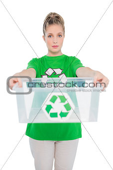 Shy environmental activist holding empty recycling box