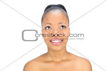 Smiling woman looking upwards