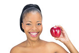 Attractive woman holding red apple