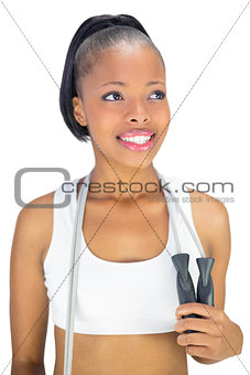 Cheerful natural model holding jump rope