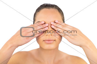 Woman keeping her eyes shut