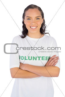 Woman wearing volunteer tshirt with arms crossed