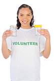 Volunteer woman showing two jars