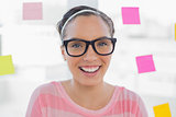Smiling woman in creative office