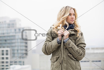 Gorgeous trendy blonde posing outdoors