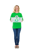 Cheerful pretty environmental activist holding recycling box