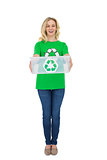 Cheerful cute environmental activist holding recycling box