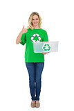 Smiling cute environmental activist holding recycling box thumb up
