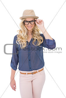 Smiling trendy blonde posing