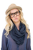 Serious trendy blonde with classy glasses posing