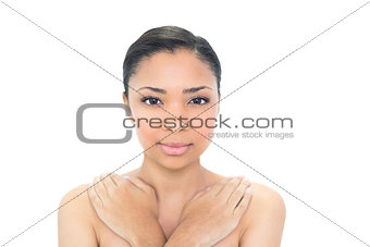 Relaxed young black haired model looking at camera