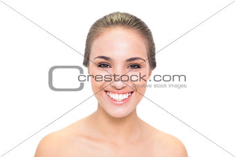Cheerful brunette woman looking at camera