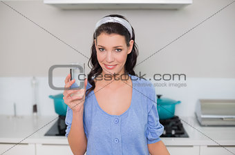 Content gorgeous model holding glass of water