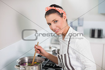 Happy gorgeous cook posing