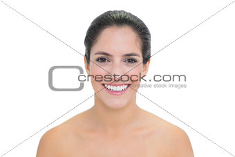 Cheerful smiling bare brunette looking at camera
