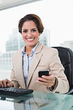 Attractive businesswoman smiling at camera