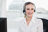 Smiling call centre agent looking at camera