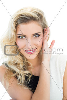 Smiling pretty blonde model looking at camera