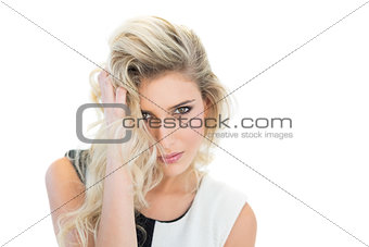 Sexy blonde model looking passionately at camera