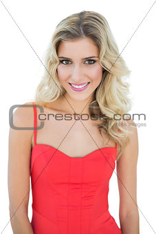 Gorgeous smiling blonde model looking at camera